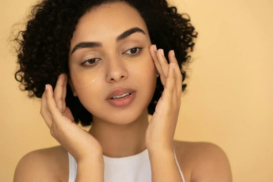 girl using under eye serum