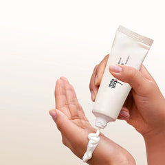 Beauty of Renforcer Relief Sunscreen Rice + Probiotics – lightweight SPF50+ sunscreen texture shown on hand for smooth application.